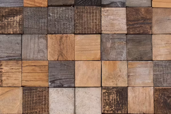 Woodshed Squares reclaimed wood tile pattern with weathered brown and gray square blocks.
